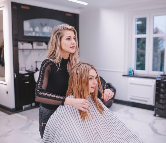 hairstylist-client-taking-salon